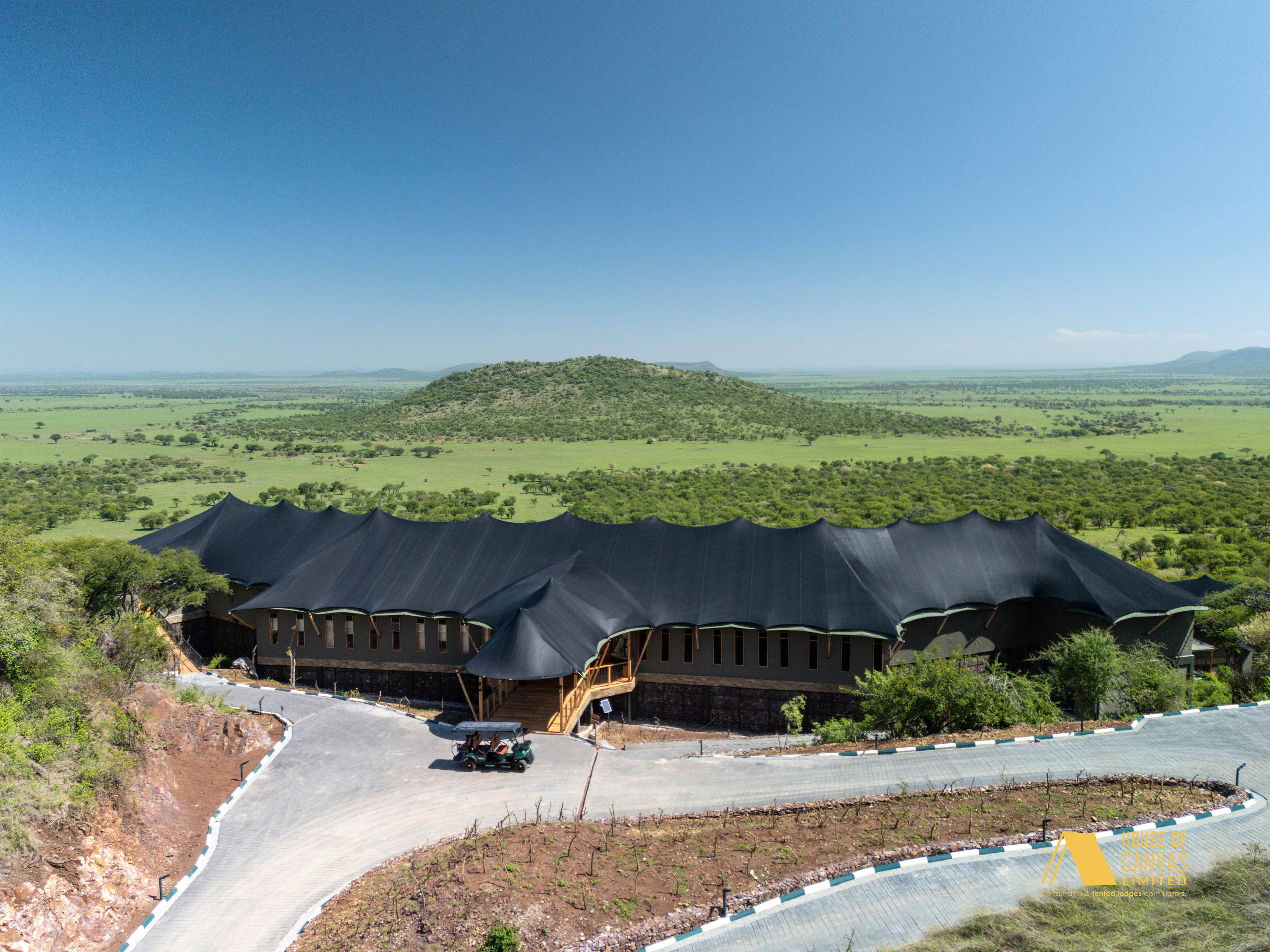 Night aerial view of illuminated safari camp