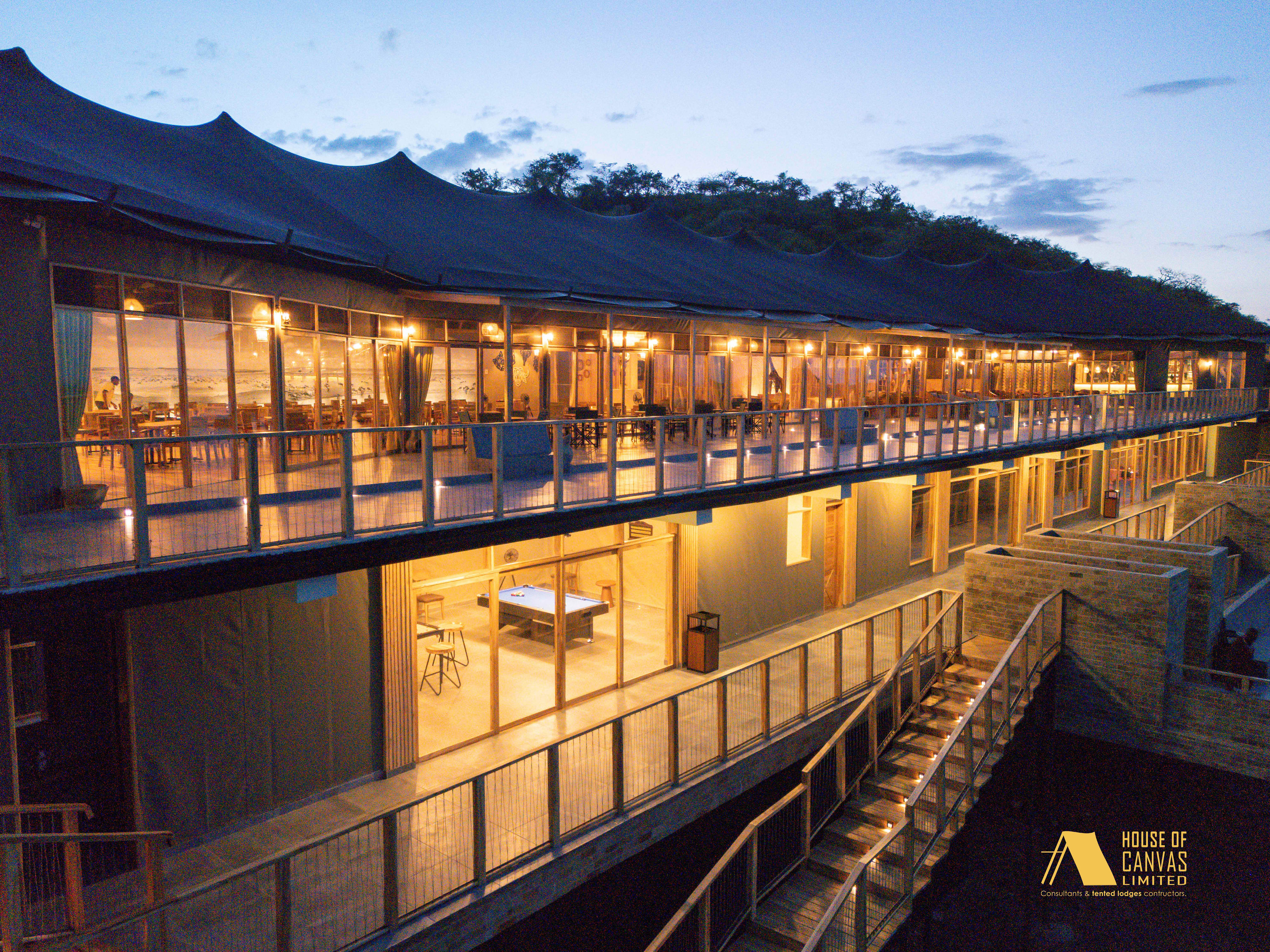 Sweeping aerial view of complete camp setup