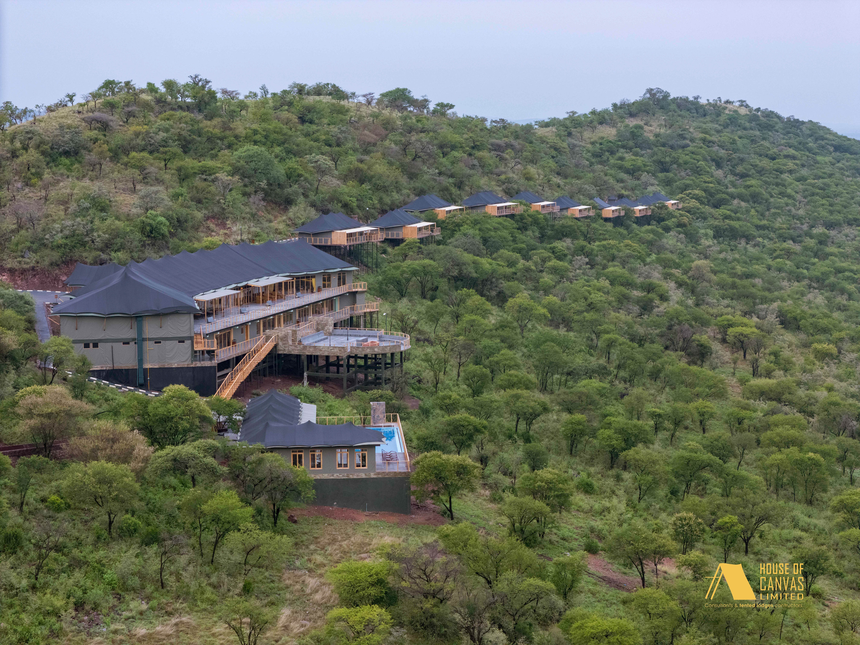Morning aerial shot of camp with sun rising