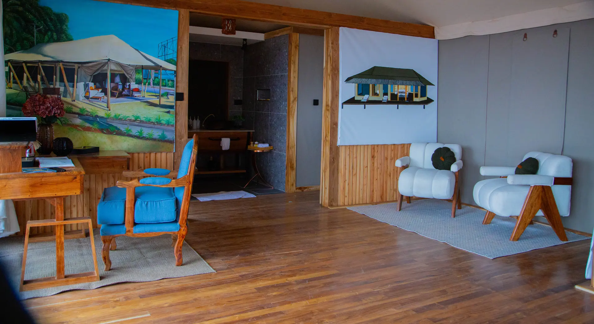 Tent reception with custom furniture and artwork